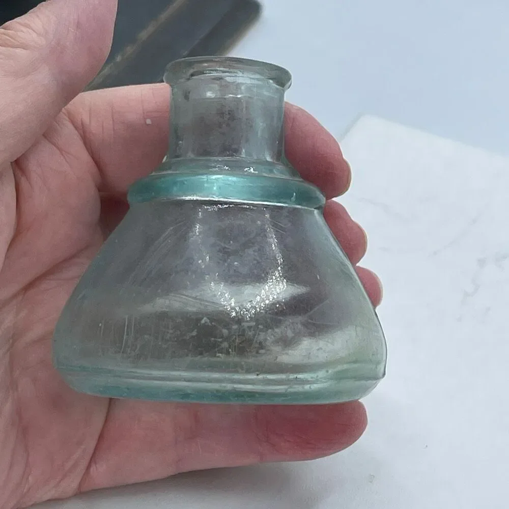 Antique Aqua -colored glass ink bottle Victorian era. Conical or umbrella shaped
